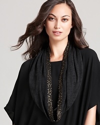 Dripping with sequins, this Eileen Fisher scarf adds a dash of drama to everyday looks.