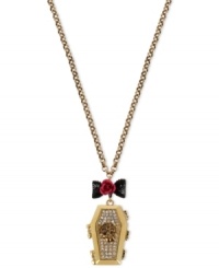 Think outside the box with this coffin pendant necklace from Betsey Johnson. Crafted from gold-tone mixed metal and featuring bow and flower details, as well as glass crystal accents, the necklace buries conventional notions of style. Approximate length: 35 inches + 3-inch extender. Approximate drop: 2-1/3 inches.