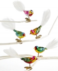 Enliven a Christmas tree with these very clever clip-on glass bird ornaments from Kurt Adler. With their jewel-tone bodies and long white feather tails, they also make a beautiful gift.