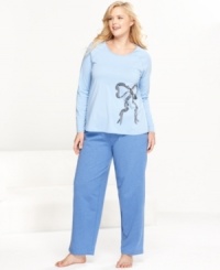 On the prowl for the season's coziest pajamas? Look no further than this fuzzy fleece plus size set by HUE, featuring a sweet top with a sequined print and full-length pajama pants.