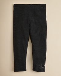 Solid legging with a heathered texture and a jeweled heart detail at the left ankle.