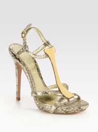 Fronted by a t-strap with goldtone metal plating, this metallic python go-to has an adjustable slingback strap and slight platform. Self-covered heel, 4 (100mm)Covered platform, 1 (25mm)Compares to a 3 heel (75mm)Python upperLeather lining and solePadded insoleMade in ItalyOUR FIT MODEL RECOMMENDS ordering one half size up as this style runs small. 