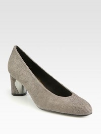 Goose-bump textured leather style is sleek and streamlined, finished with a chunky, metal accented heel.Covered heel, 2¼ (55mm)Textured leather upperUltrasuede liningPadded insoleLeather soleMade in SpainAdditional InformationShipping timeline for this item Women's Shoe Size Guide (International Equivalents) This item cannot be shipped via Rush, Next Business Day, Saturday delivery.This item cannot be shipped to a P.O. Box, APO/FPO or U.S. Territory. 