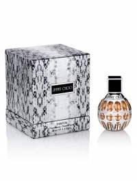 EXCLUSIVELY AT SAKS. Limited Edition Parfum, a warmer and more sensual version of the original, with notes of tiger orchid enhanced with an addictive candied orange and the irresistible trail of toffee chypre. The faceted bottle is decorated with brilliant silver and is presented in python print packaging reimagined in silver and black. 1.3 oz. 