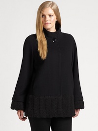 Taking a cue from vintage Hollywood glamour, a gorgeous swing coat with chic knit details and convenient slash pockets.Oversized collarLong sleevesConcealed button frontSlash pocketsRibbed-knit trimFully linedAbout 28 from shoulder to hem60% wool/20% cashmere/20% nylonDry cleanMade in Italy