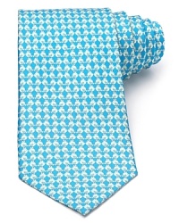 A classic silk tie from Salvatore Ferragamo, showcasing a charming chick print.