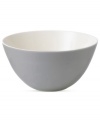 Effortlessly chic, the Simplicity serving bowl by Vera Wang Wedgwood features a modern silhouette dressed in a neutral cream and gray palette.