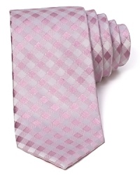 In silk satin, this gingham patterned tie lends a lighthearted, classic look.