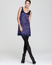 Iridescent sequins capture the light and radiate chic on this French Connection party dress. Shine on into the night with simple accessories that show off this piece's sparkle.