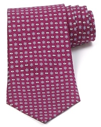 Daisies and bees flourish on this lushly colored tie from Salvatore Ferragamo, rendered in super-soft Italian silk for a lavish look and feel.