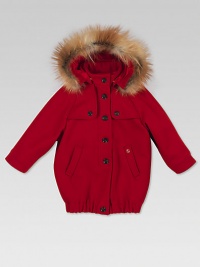 Button-front, wool-blend, felt parka with attached hood, fox fur trim, tone-on-tone GG lining and metal interlocking Gucci detail.Attached hoodLong sleevesFront button placketTwo buttoned storm flapsAngled pocketsElasticized hem70% wool/20% polyamide/10% cashmereDry cleanMade in ItalyFox fur: Finland, Denmark and Canada Please note: Number of buttons may vary depending on size ordered. 