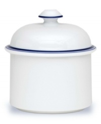 Named for a trendy Copenhagen neighborhood but designed with timeless style, the Christianshavn Blue covered sugar bowl features a double band of navy in pristine white porcelain. From Dansk.