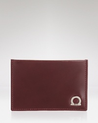 A refined leather credit card holder with a contrast color back expresses your keen eye for superior quality.