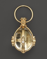 18K yellow gold, set with diamonds, frames a crystal. By Temple St. Clair.