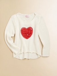 Sending hearts aflutter, this cute plush knit features a trendy hi-lo hem and tender appliqué.ScoopneckLong sleevesPullover styleHi-lo hem95% viscose/5% spandexHand washImported