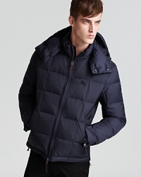 Tame the winter with this quilted puffer filled with down to maximize your journey across the frozen tundra or even just your snowed-in driveway. A classic, well-crafted design from Burberry Brit.