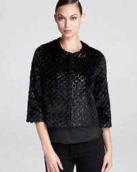 Exotics go elegant as sequin embellishment illuminates a textured DKNY faux-fur jacket. Whether worn with cocktail dresses or distressed denim, the luxe piece layers on for instant glamour.