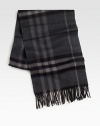 Luxurious and soft cashmere in a classic oversized check pattern with fringed edges.Fringed edgesAbout 12W x 66LCashmereDry cleanImported