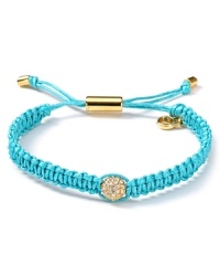 Tie on bold style with this wrap bracelet from MICHAEL Michael Kors. Crafted from woven cord and accented by a fireball station, it perfects effortless glamor.