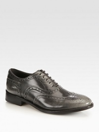 A traditional wingtip and perforated details top this burnished leather favorite with a subtle hint of sheen. Stacked heel, 1¼ (30mm)Leather upperLeather liningLeather and rubber solePadded insoleMade in Italy