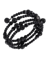 Let this sleek black bracelet coil around your wrist like a snake. Crafted by Carolee, this three row stretch bracelet features faceted jet beads set in hematite-plated mixed metal. Approximate diameter: 2-1/4 inches.