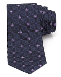 A handsome tie from Valentino in plush Italian silk brings refinement to your everyday office attire and special occasions alike.