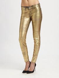 Lustrous goldtone finish gives these leggings-style skinny jeans a new lease of life. THE FITRise, about 8Inseam, about 30THE DETAILSButton closureZip flyFour-pocket styleCotton/polyester/elastaneDry cleanMade in USA of imported fabricModel shown is 5'10 (177cm) wearing US size 4.