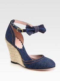 Held in place by an adjustable, bow-adorned ankle strap, this stretchy denim classic is updated by a unique espadrille wedge. Hemp wedge, 4 (100mm)Denim upperDenim liningLeather solePadded insoleMade in ItalyOUR FIT MODEL RECOMMENDS ordering true size. 