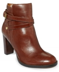 Small and sophisticated. Ivanka Trump's Taryn booties feature an ankle strap buckle and inside zipper.