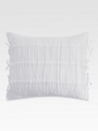 Make your bed especially inviting with this feather-filled, pure white pillow soften with shirring and side ties.16 X 20Feather fillingCottonMachine wash coverImported