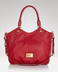 MARC BY MARC JACOBS's signature leather tote is endlessly versatile and oh so right, day or night.