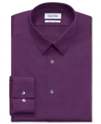 Look sharp in this handsome slim fit dress shirt by Calvin Klein.