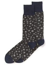 An alluring pattern of stars and moons adorns these cool socks from the always clever Paul Smith.