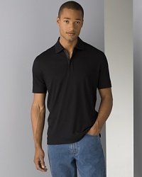 BOSS Black Verona zip polo. Short sleeved zip placket polo shirt. Wide hem on edge of sleeves and bottom of shirt.