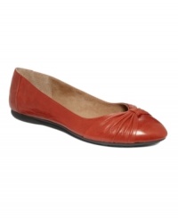 Twisted elegance. Easy Spirit's Sania flats are made of pebbled leather and feature a faux bow know around the cap toe.