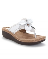 The Clarks Latin Samba sandals are ready to dance all night (or just kick back and relax) with their fun floral corsage, breezy thong upper and comfy suede footbed.