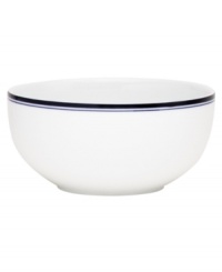 Named for a trendy Copenhagen neighborhood but designed with timeless style, the Christianshavn Blue all-purpose bowl features a double band of navy in pristine white porcelain. From Dansk.