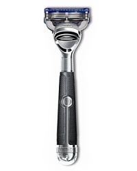 The Fusion Chrome Collection POWER RAZOR from The Art of Shaving is perfectly balanced and weighted to feel like a natural extension of your hand, maximizing stability and control. Gentle micro pulses reduce friction and increase razor glide. The built in spotlight, the first of its kind, reveals details normally in shadow-such as under the chin and jaw line-to help you avoid missed spots and make every stroke count. The sleek, contemporary handle is an ideal combination of ergonomics and innovative design, handcrafted in polished chrome andwrapped in a matte black, thermo resin grip.NEW! Fusion ® ProGlide ™ Power is Gillette's most advanced blade ever. On the front, thinner, finer blades glide effortlessly with less tug and pull for incredible comfort. On the back, the re-designed Precision trimmer with improved blade allows you to trim sideburns easily, shave under the nose and shape facial hair.Includes an 8-Pack of replacement ProGlide Blades. A $32 value.