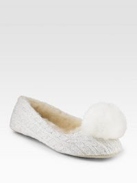 Pristine cabled cotton is adorned with glitter and a soft, pompom at the toe.Round toe Suede sole Imported