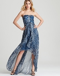 In a cool blue abstract print, Laundry by Shelli Segal's high-low hemmed dress makes waves in a strapless silhouette with beaded accents.