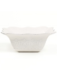 A delicate scalloped edge and embossed design give the the Blanc serving bowl the classic, romantic feel of Versailles Maison's charming dinnerware collection.