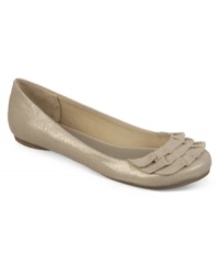 Round toes and ruffles. The Aloha ballet flats by Fergalicious are a feminine take on the classic shape.