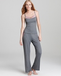 With pretty lace details and bow accents, Honeydew's ribbed camisole and pants are a sweet set for sleep.