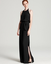 Get all-in-one glamor with an Alexis jumpsuit--dramatic side slits, a keyhole halter neckline, and belted waist comprise an elegant evening look in one complete package.