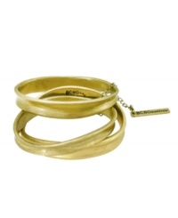 Modern stackable style with a vintage twist. BCBGeneration's trendy three-piece bangle set features an asymmetrical, graduated design in oxidized gold tone mixed metal. Approximate diameter: 2-1/2 inches.