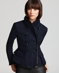 Master military-chic in an impeccably tailored Burberry Brit blazer. With a striking peplum hem and sleek leather trim, this luxe look is far from buttoned-up.