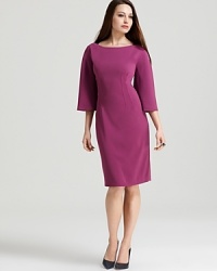 Shift from day to night in T Tahari's sophisticated Rochelle dress, a classic style with timeless appeal. A bright berry hue lends an of-the-moment look.