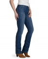 Levi's petite straight-leg jeans feature a flattering fit enhanced by a fashionable wash and a slimming, smoothing fabric panel at the interior.