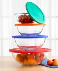 Perfect for virtually every kitchen task - cooking, serving and storage - this set of four covered bowls can go from the freezer to the oven or microwave and straight to the dinner table. Made of durable, impact resistant Pyrex with colorful, tight-fitting lids that lock in freshness. Easy to clean. Two-year warranty.