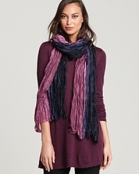 Breathe distinctive life into your everyday look with this Eileen Fisher silk wrap billowing with bold bursts of color.